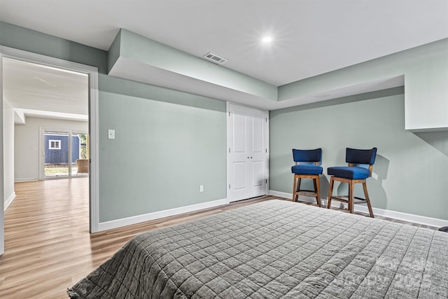 bedroom with light hardwood / wood-style floors