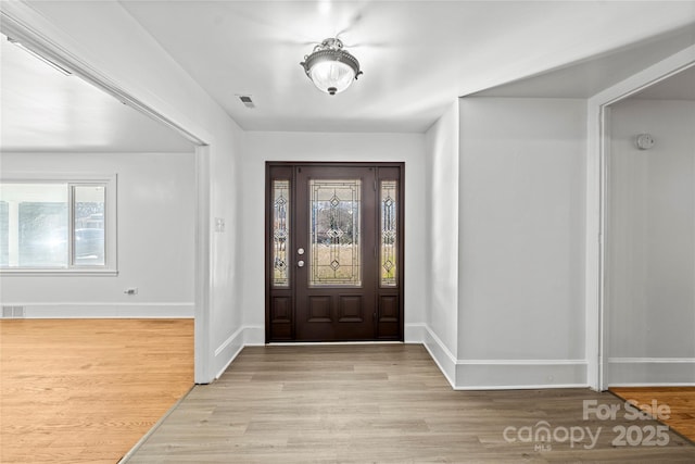 foyer with light wood-type flooring