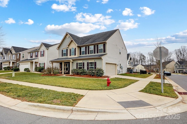 view of front of home featuring an attached garage, a residential view, concrete driveway, and a front yard