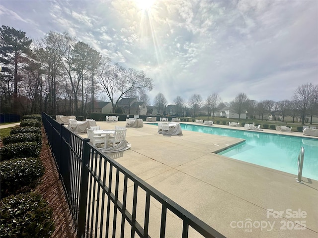 pool featuring a patio