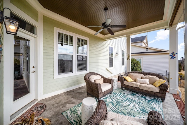 exterior space with ceiling fan and outdoor lounge area