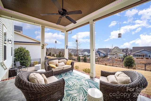 view of patio with ceiling fan and an outdoor hangout area