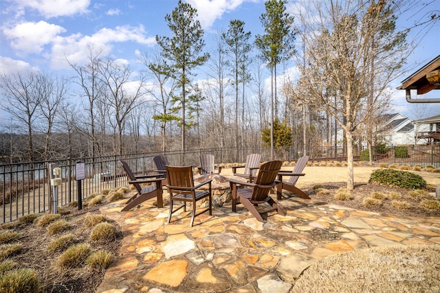 view of patio / terrace with an outdoor fire pit