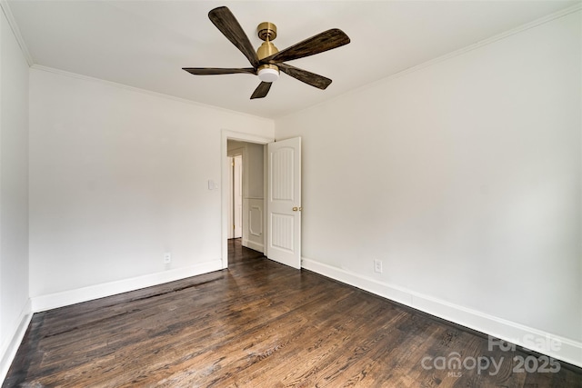 spare room featuring crown molding, ceiling fan, and dark hardwood / wood-style flooring