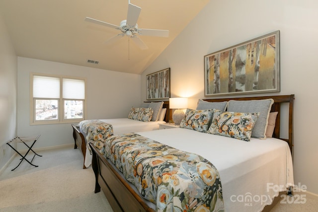 bedroom with lofted ceiling, light colored carpet, and ceiling fan