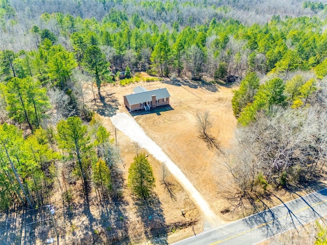 drone / aerial view with a view of trees