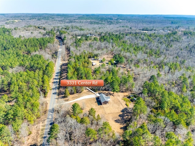 bird's eye view with a view of trees