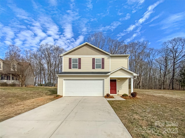 view of front facade with a garage and a front yard