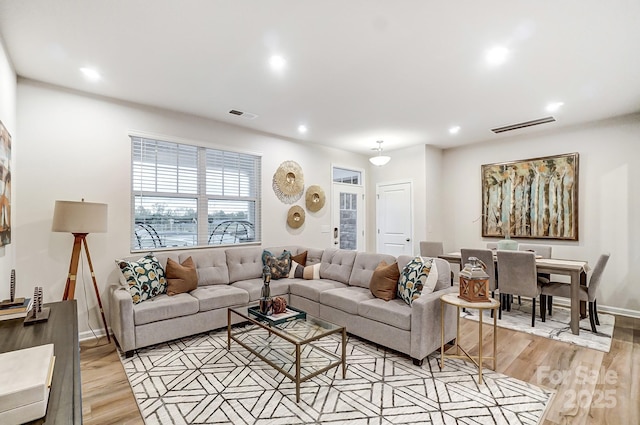 living room with light wood-type flooring