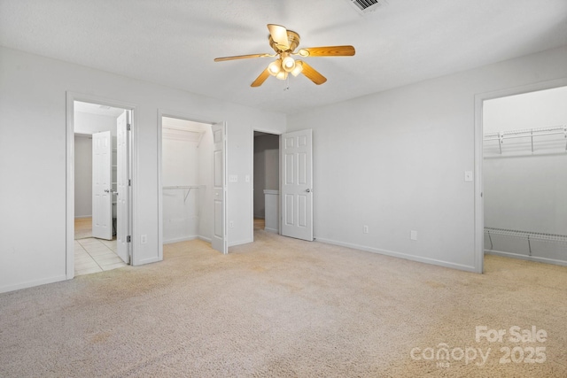 505 Victory Trl, Morganton, NC 28655 - unfurnished bedroom with a closet, a spacious closet, and carpet