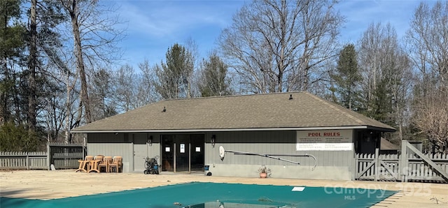 505 Victory Trl, Morganton, NC 28655 - back of house featuring roof with shingles and fence