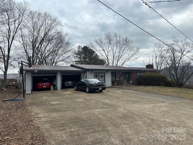 ranch-style home with a garage