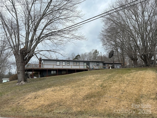 exterior space with a front lawn