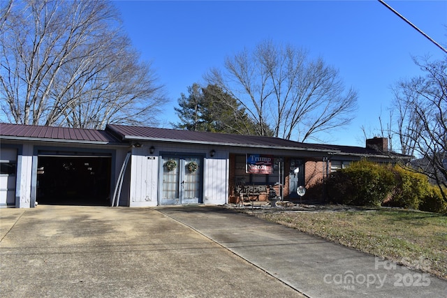 exterior space with a garage