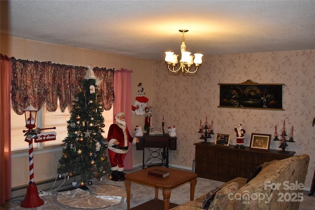 living room with a textured ceiling and a notable chandelier