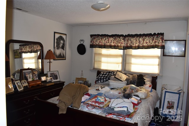 bedroom with a textured ceiling