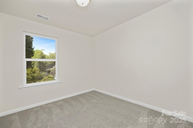 view of carpeted spare room