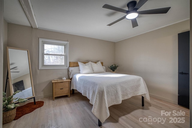 bedroom featuring ceiling fan and light hardwood / wood-style floors