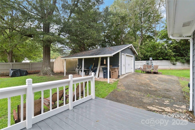 107 Deese Ct, Indian Trail, NC 28079 - deck featuring an outdoor structure, a detached garage, and driveway