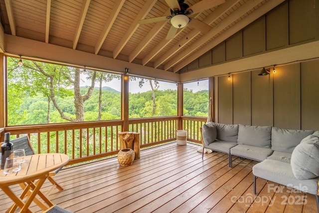 sunroom / solarium featuring wood ceiling, ceiling fan, and lofted ceiling with beams