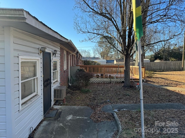 view of yard featuring a wooden deck