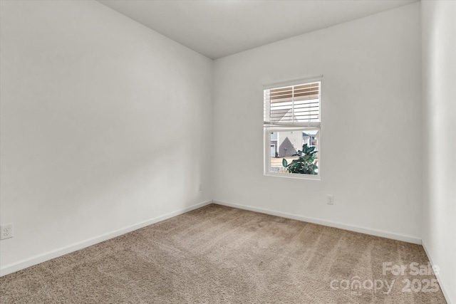 empty room with carpet flooring