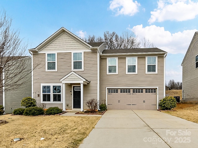 front of property with a garage