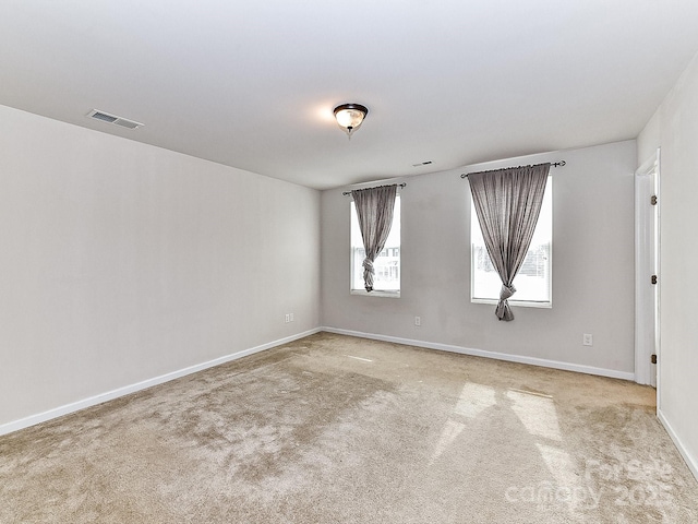 view of carpeted spare room