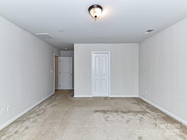 view of carpeted spare room