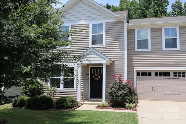 1128 Tangle Ridge Dr SE, Concord, NC 28025 - view of front of home with an attached garage