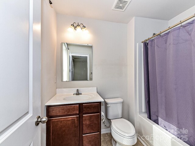 1128 Tangle Ridge Dr SE, Concord, NC 28025 - full bathroom featuring vanity, shower / bathtub combination with curtain, and tile patterned floors