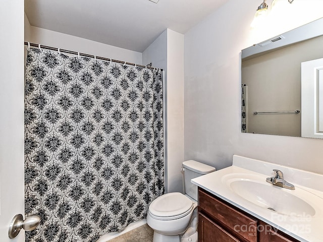 1128 Tangle Ridge Dr SE, Concord, NC 28025 - bathroom featuring vanity, curtained shower, and tile patterned flooring