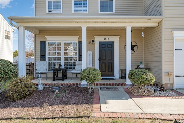 entrance to property with covered porch