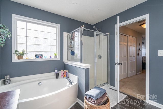 bathroom with independent shower and bath