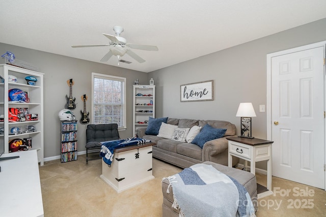 living room with light colored carpet and ceiling fan