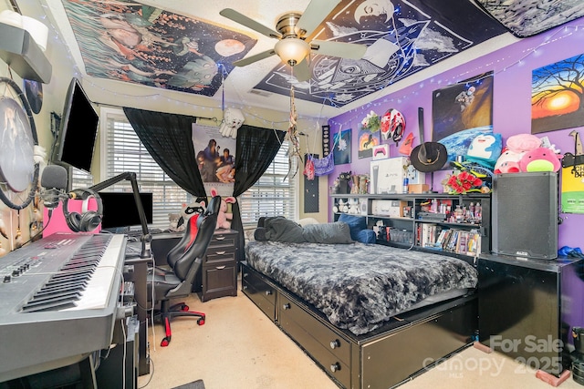 carpeted bedroom with ceiling fan