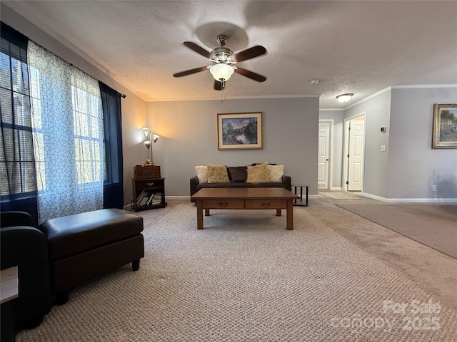 living room featuring crown molding, ceiling fan, light carpet, and a textured ceiling