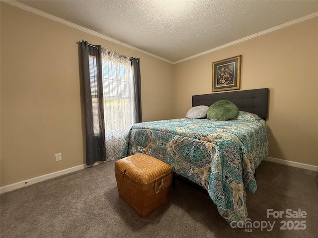 bedroom featuring crown molding, carpet floors, and a textured ceiling