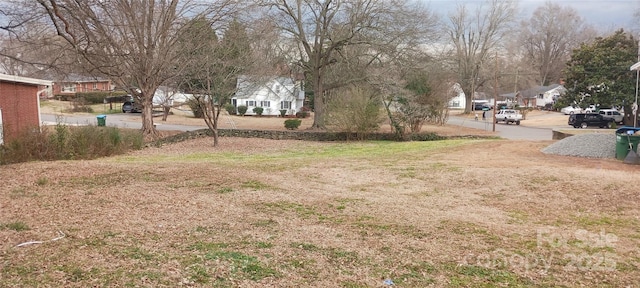 view of yard featuring a residential view