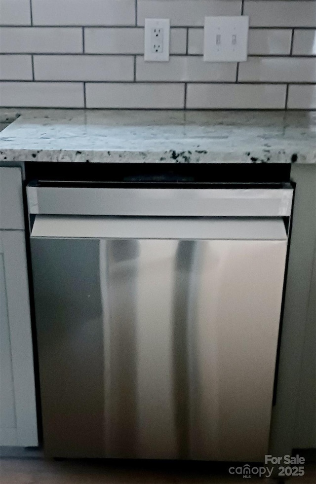 details featuring stainless steel dishwasher