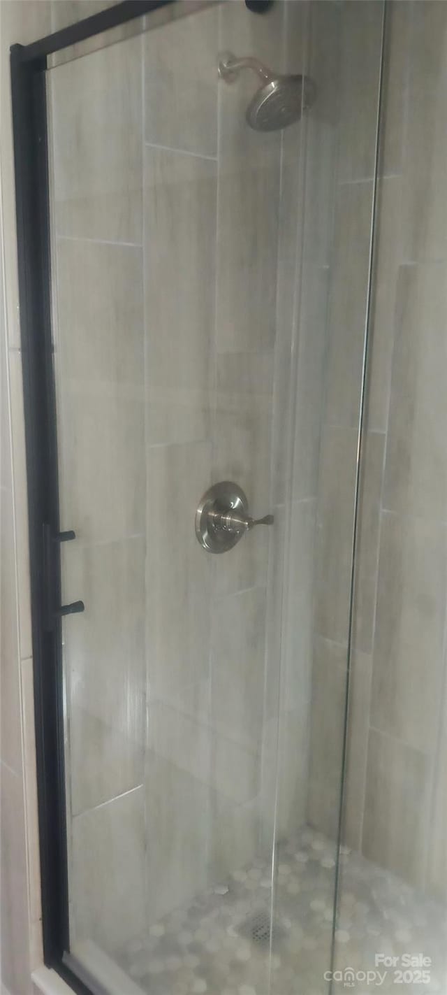 bathroom featuring a stall shower