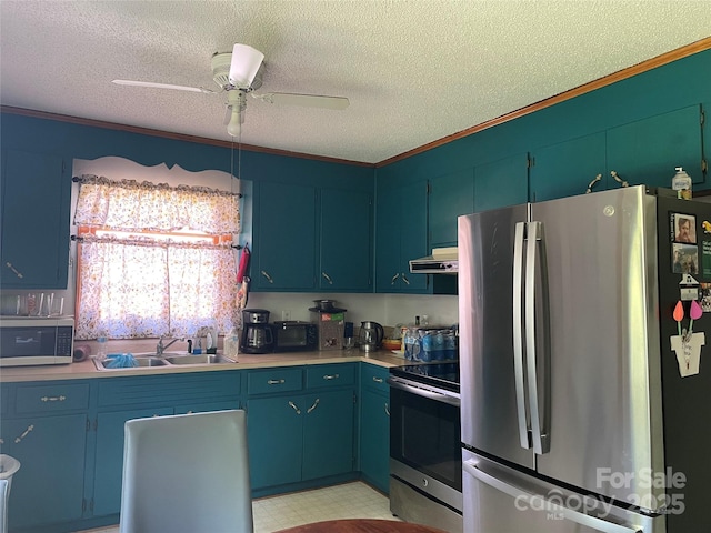 kitchen with sink, crown molding, blue cabinetry, and appliances with stainless steel finishes