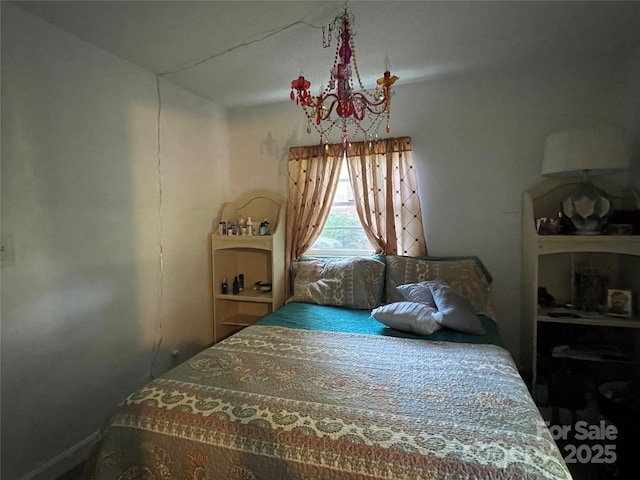 bedroom with a chandelier