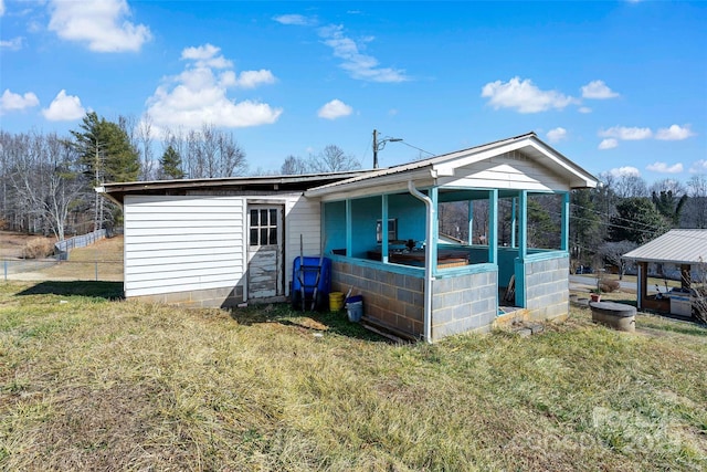 exterior space with a front yard