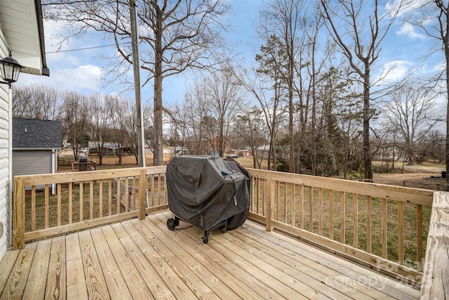 deck featuring a grill