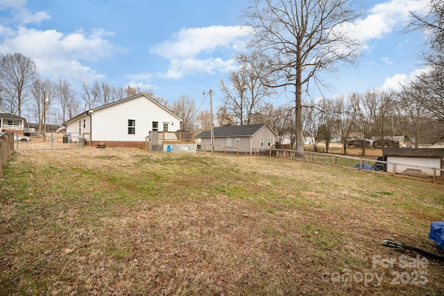 view of yard with a wooden deck