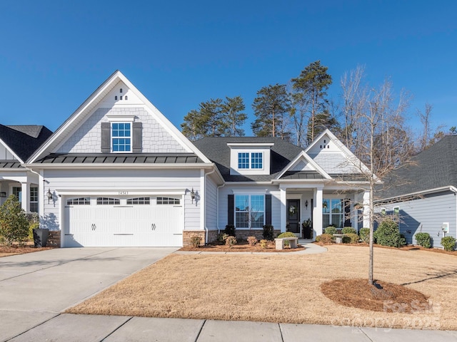 craftsman house with a garage