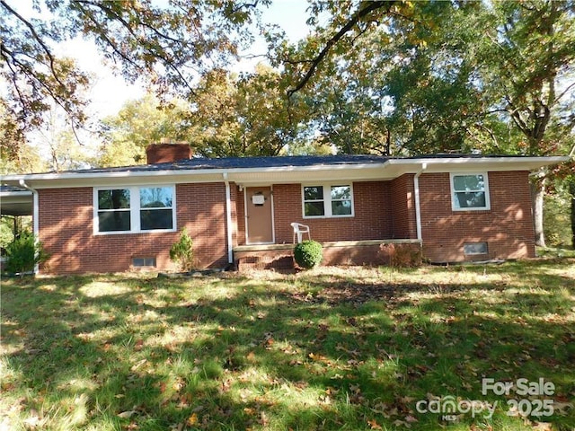 single story home featuring a front yard