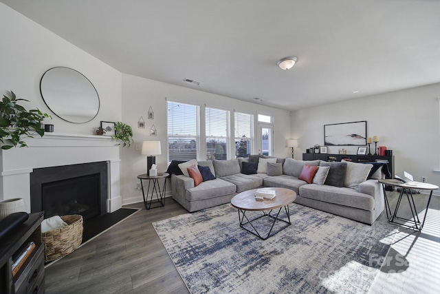 living room with dark wood-type flooring