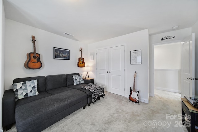 living room featuring light carpet